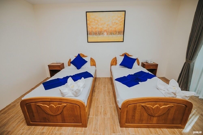 Imagen de la habitación del Hotel Chaung Tha Lodge. Foto 8