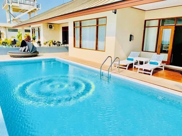 Imagen de la habitación del Hotel Chaung Tha Lodge. Foto 12