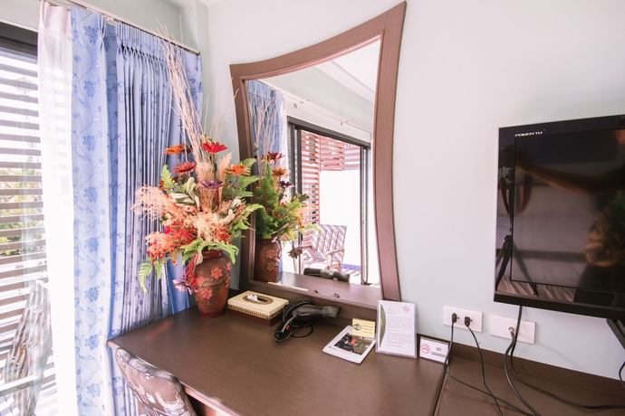 Imagen de la habitación del Hotel Chayadol Resort. Foto 9