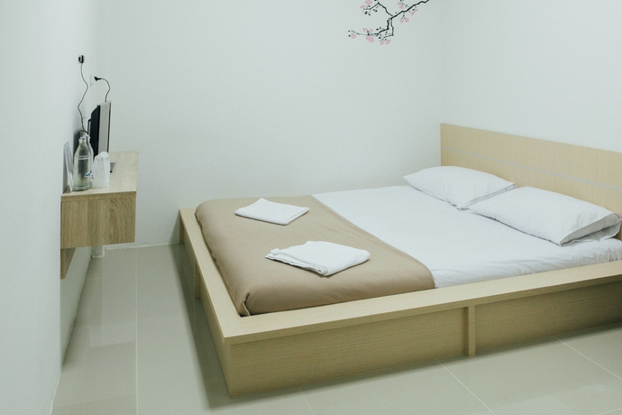 Imagen de la habitación del Hotel Cheaper Room. Foto 6