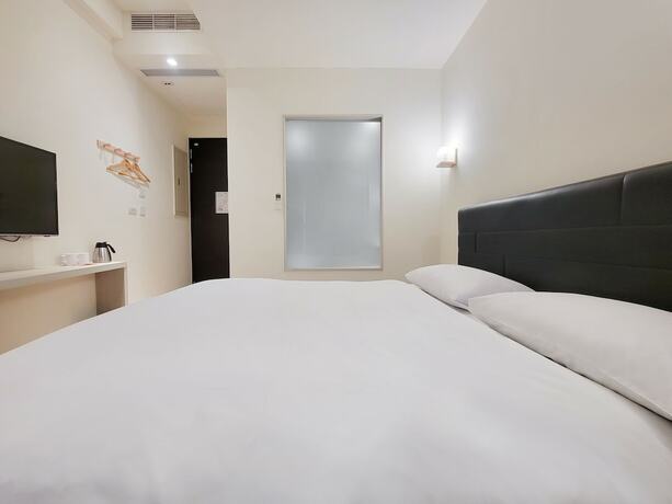 Imagen de la habitación del Hotel Check Inn Express Taichung Fuxing. Foto 13