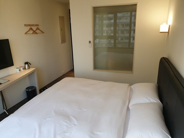 Imagen de la habitación del Hotel Check Inn Express Taichung Fuxing. Foto 27