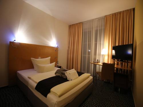 Imagen de la habitación del Hotel Check Inn. Foto 3