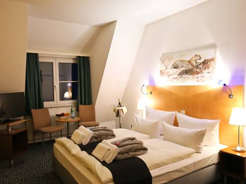 Imagen de la habitación del Hotel Check Inn. Foto 4