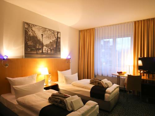 Imagen de la habitación del Hotel Check Inn. Foto 5