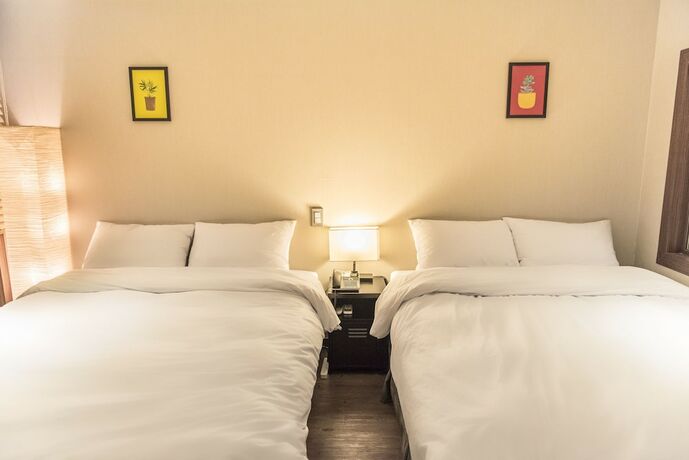 Imagen de la habitación del Hotel Check Inn Jeju. Foto 15