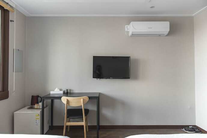 Imagen de la habitación del Hotel Check Inn Jeju. Foto 18