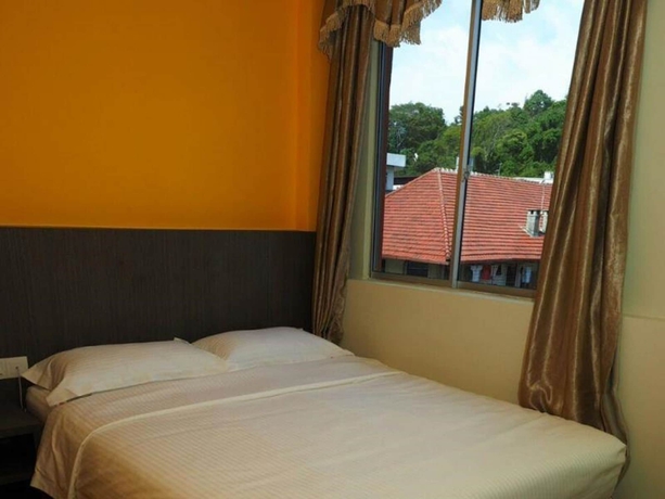 Imagen de la habitación del Hotel Check Inn Kk. Foto 11