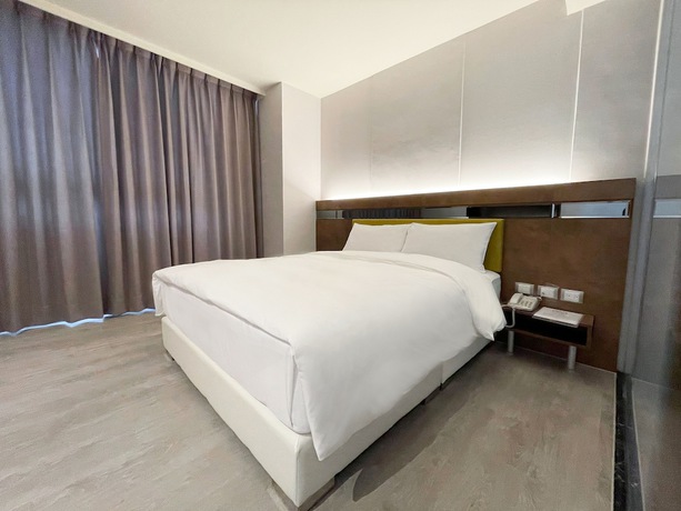 Imagen de la habitación del Hotel Check Inn Taichung Qinghai. Foto 11