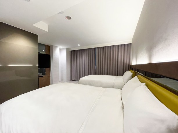 Imagen de la habitación del Hotel Check Inn Taichung Qinghai. Foto 12