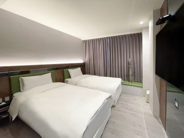 Imagen de la habitación del Hotel Check Inn Taichung Qinghai. Foto 14