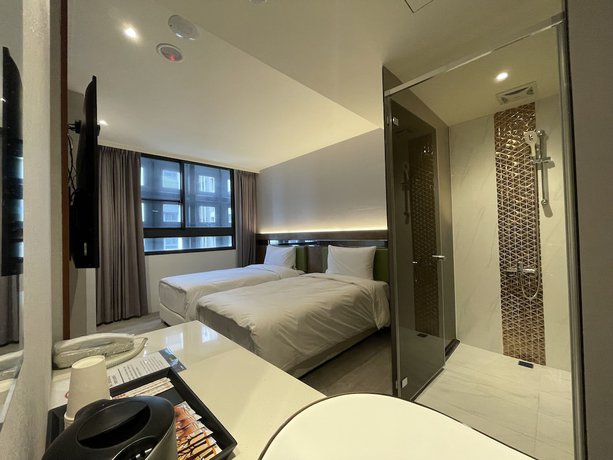 Imagen de la habitación del Hotel Check Inn Taichung Qinghai. Foto 15