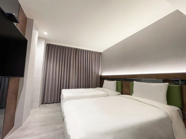 Imagen de la habitación del Hotel Check Inn Taichung Qinghai. Foto 16