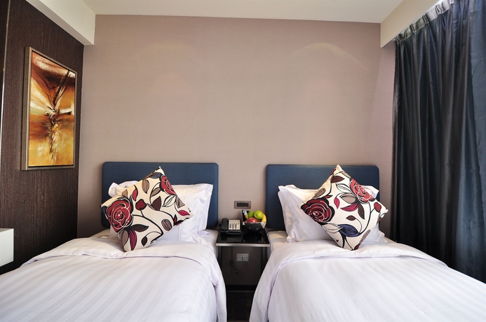 Imagen de la habitación del Hotel Check Inn Taipei Xinyi. Foto 2