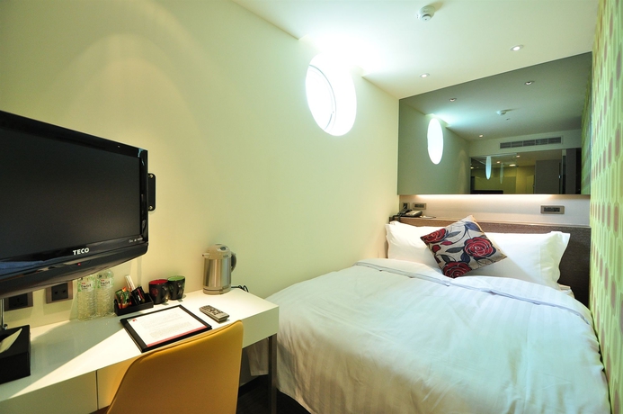 Imagen de la habitación del Hotel Check Inn Taipei Xinyi. Foto 4