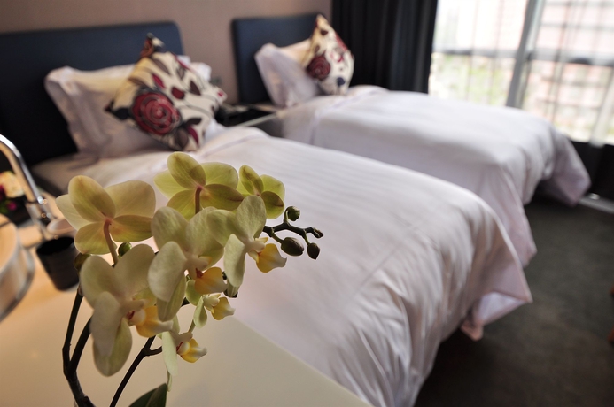 Imagen de la habitación del Hotel Check Inn Taipei Xinyi. Foto 9