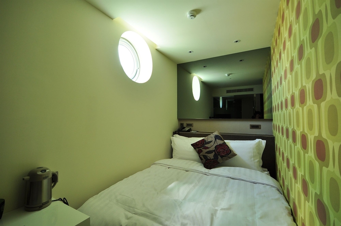 Imagen de la habitación del Hotel Check Inn Taipei Xinyi. Foto 10