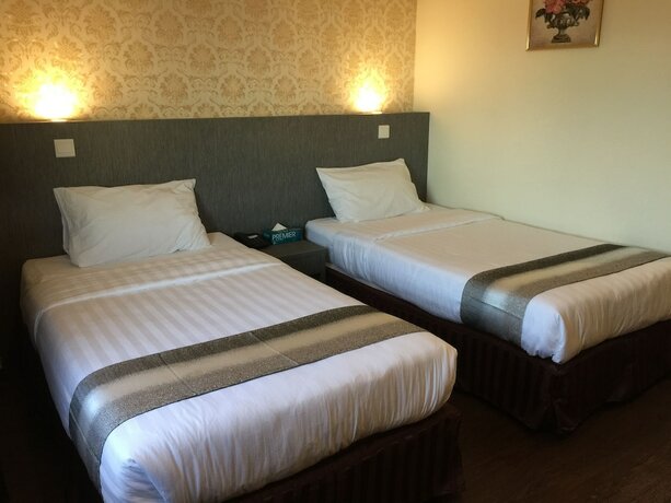 Imagen de la habitación del Hotel Check Inn Tawau. Foto 15