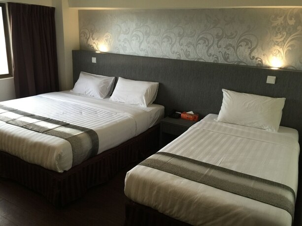 Imagen de la habitación del Hotel Check Inn Tawau. Foto 16
