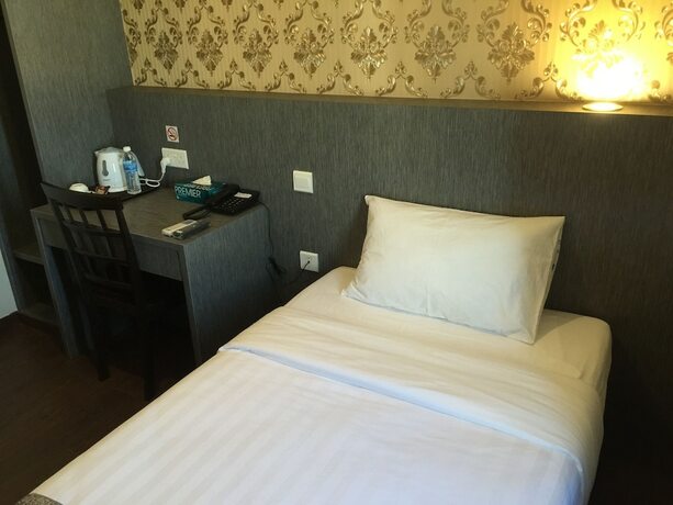 Imagen de la habitación del Hotel Check Inn Tawau. Foto 21