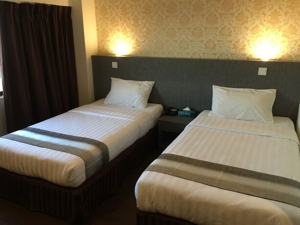 Imagen de la habitación del Hotel Check Inn Tawau. Foto 22