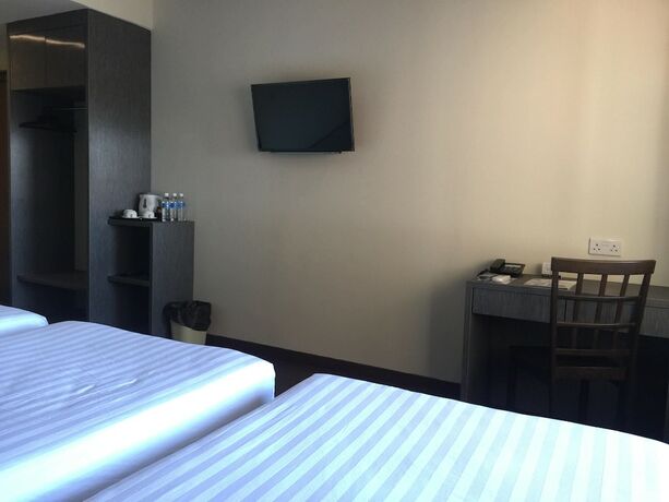 Imagen de la habitación del Hotel Check Inn Tawau. Foto 23