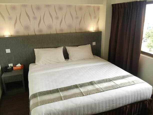 Imagen de la habitación del Hotel Check Inn Tawau. Foto 24