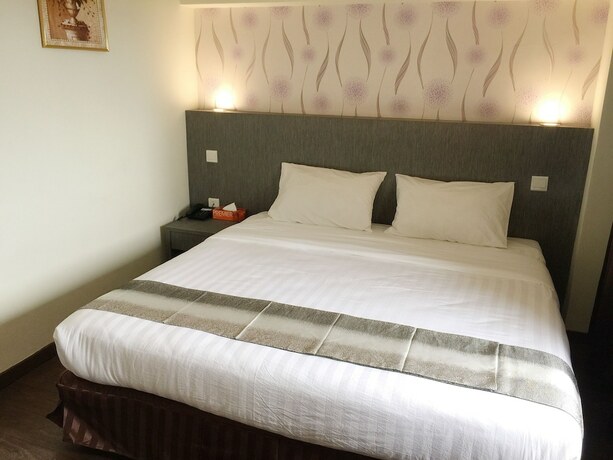Imagen de la habitación del Hotel Check Inn Tawau. Foto 25