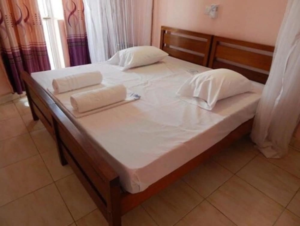 Imagen de la habitación del Hotel Check Point Inn Mombasa. Foto 10