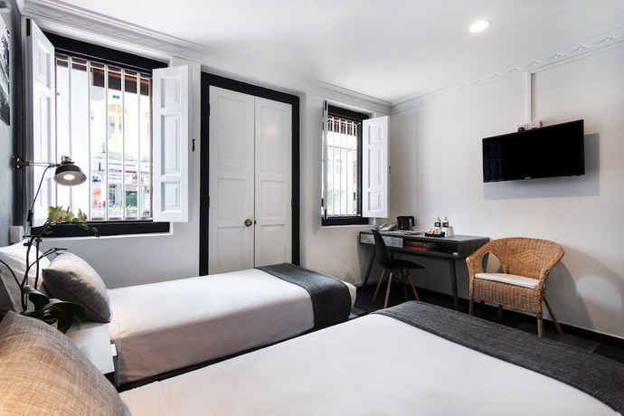 Imagen de la habitación del Hotel Check-Inn at Little India. Foto 7