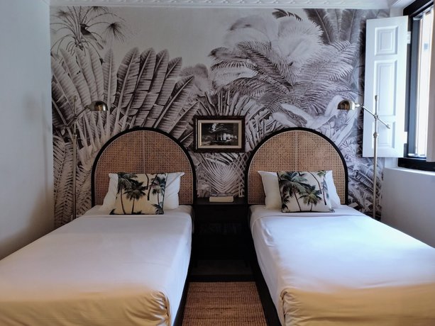 Imagen de la habitación del Hotel Check-Inn at Little India. Foto 15