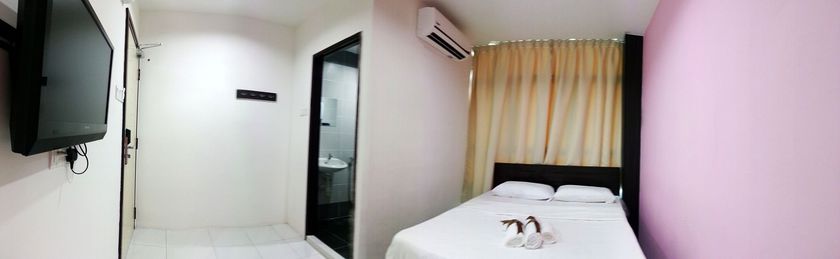 Imagen de la habitación del Hotel Checkedinn. Foto 6