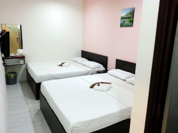 Imagen de la habitación del Hotel Checkedinn. Foto 7
