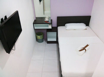 Imagen de los interiores del Hotel Checkedinn. Foto 14