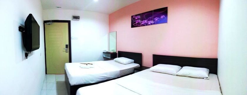 Imagen de la habitación del Hotel Checkedinn. Foto 11