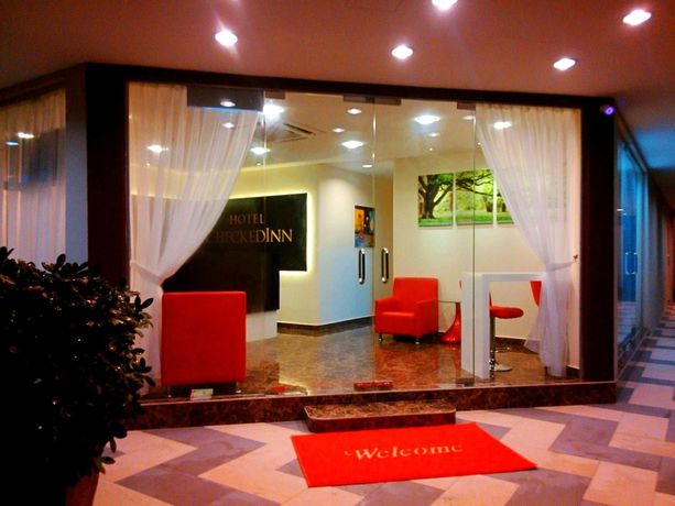 Imagen de la habitación del Hotel Checkedinn. Foto 12