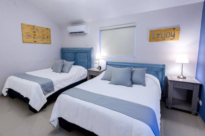 Imagen de la habitación del Hotel Checkin El Cortecito Beach. Foto 3