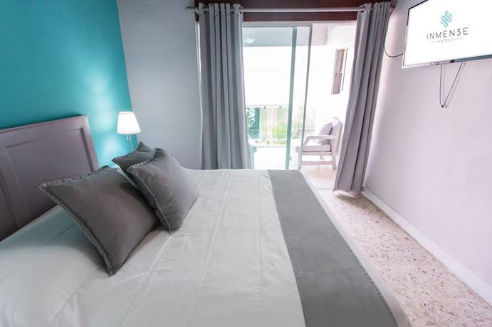 Imagen de la habitación del Hotel Checkin El Cortecito Beach. Foto 7