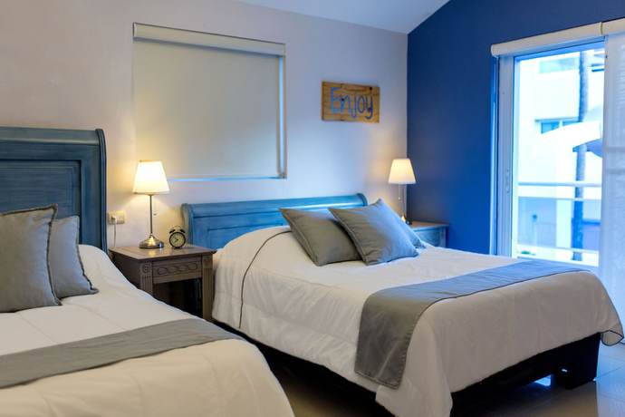 Imagen de la habitación del Hotel Checkin El Cortecito Beach. Foto 8