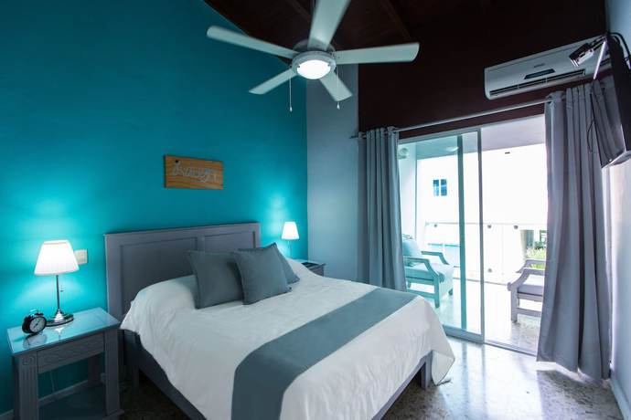 Imagen de la habitación del Hotel Checkin El Cortecito Beach. Foto 9
