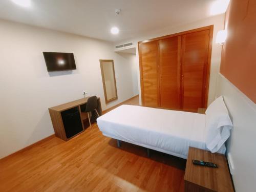 Imagen de la habitación del Hotel Checkin Madrid Móstoles. Foto 9