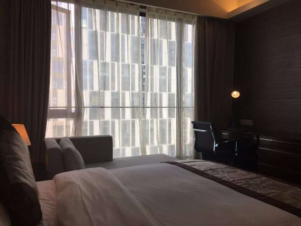 Imagen general del Hotel Checkinn Business Apartment-poly World. Foto 12