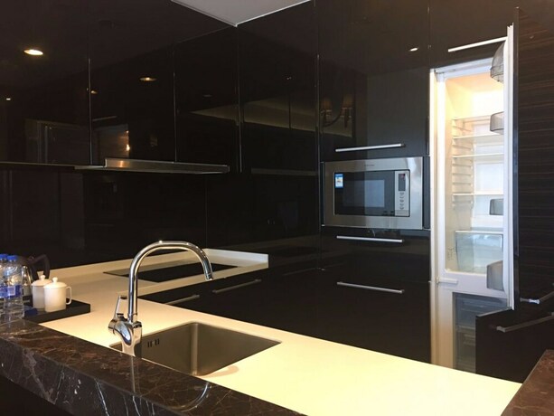 Imagen de la habitación del Hotel Checkinn Business Apartment-poly World. Foto 14
