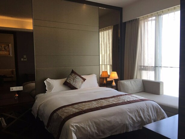 Imagen de la habitación del Hotel Checkinn Business Apartment-poly World. Foto 15