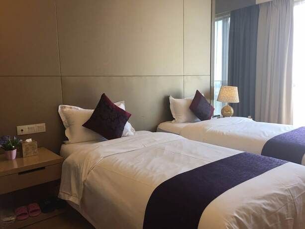 Imagen de la habitación del Hotel Checkinn Business Apartment-poly World. Foto 20