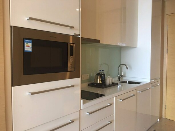 Imagen de la habitación del Hotel Checkinn Business Apartment-poly World. Foto 21
