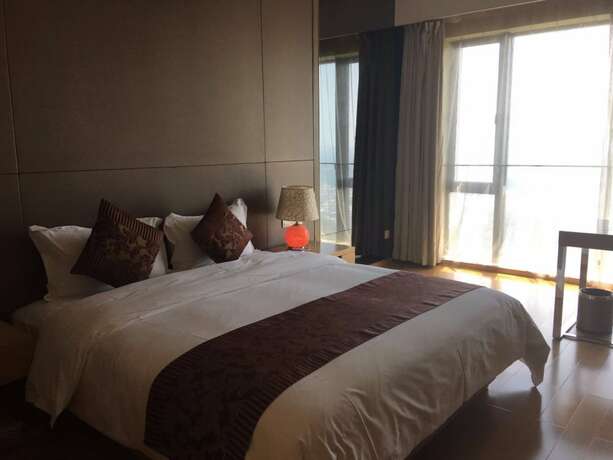 Imagen de la habitación del Hotel Checkinn Business Apartment-poly World. Foto 26