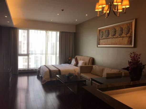 Imagen de la habitación del Hotel Checkinn Business Apartment-poly World. Foto 28