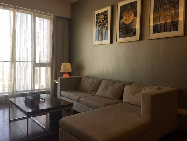 Imagen de la habitación del Hotel Checkinn Business Apartment-poly World. Foto 29