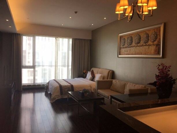 Imagen de la habitación del Hotel Checkinn Business Apartment-poly World. Foto 31